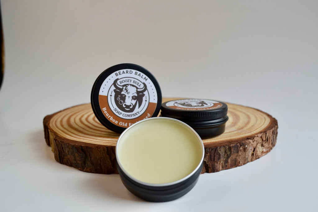 Beard balm container with wooden lid on a white background