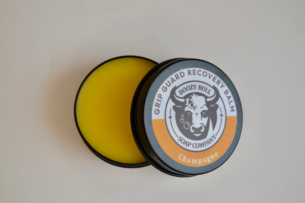 Grip Guard Recovery Balm container with 'Boozy Bull Soap Company' branding on a light gray background